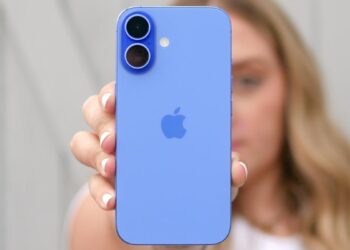 Apple iPhone 16 held in the hand.