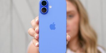 Apple iPhone 16 held in the hand.