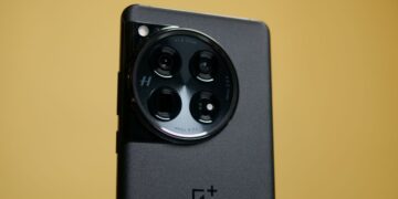 OnePlus 12 held in the hand.